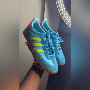 Adidas Sky Blue Sneakers with Yellow Stripes